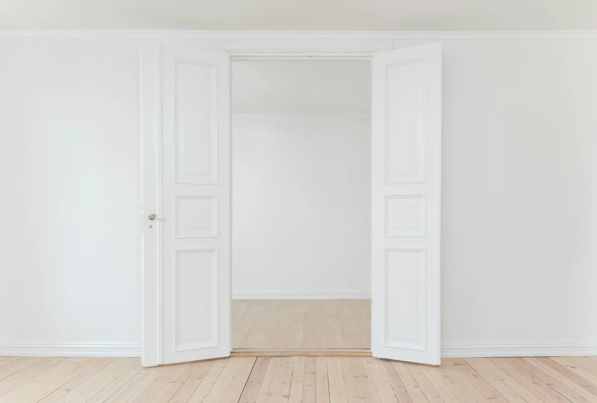 minimalist photography of open door